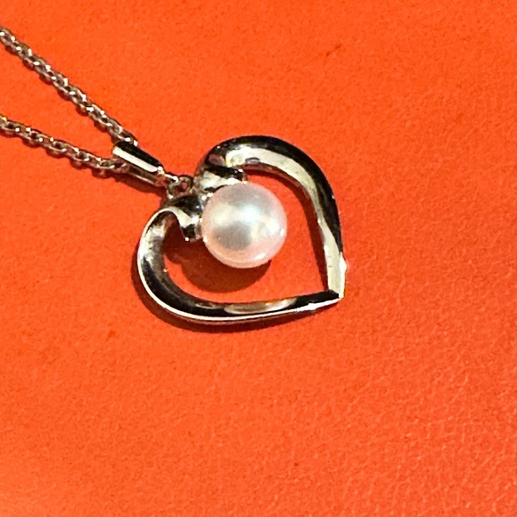 Mikimoto Silver Heart Necklace with Pearl
925 silver made. - Picture 4 of 12